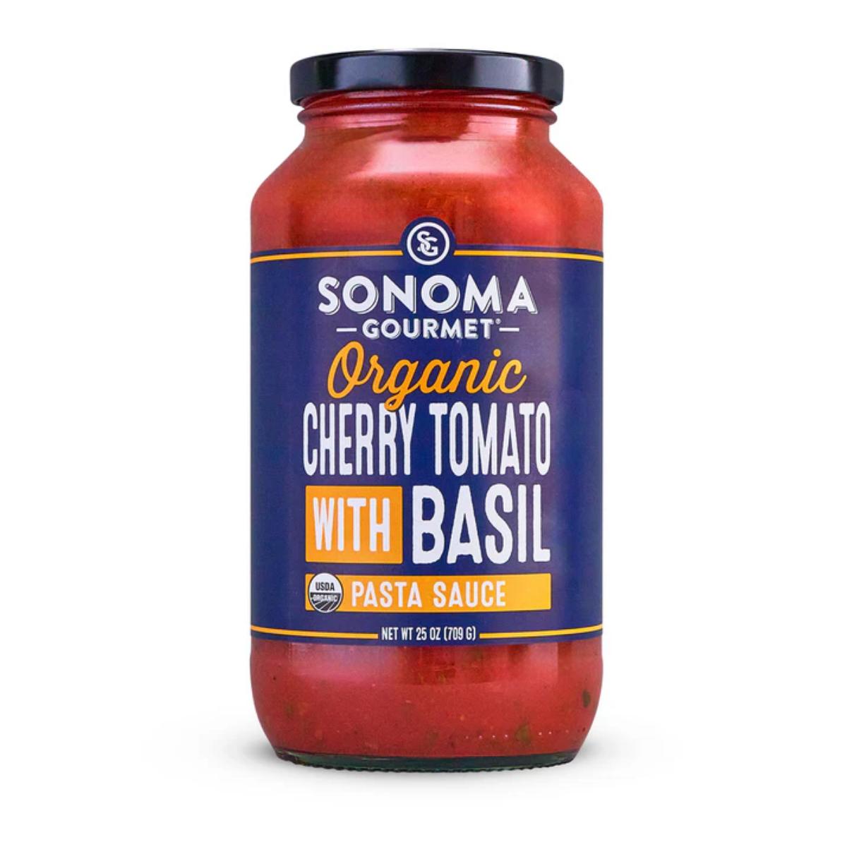 709g glass jar of Sonoma Gourmet organic cherry tomato and basil pasta sauce with a blue label and black lid.