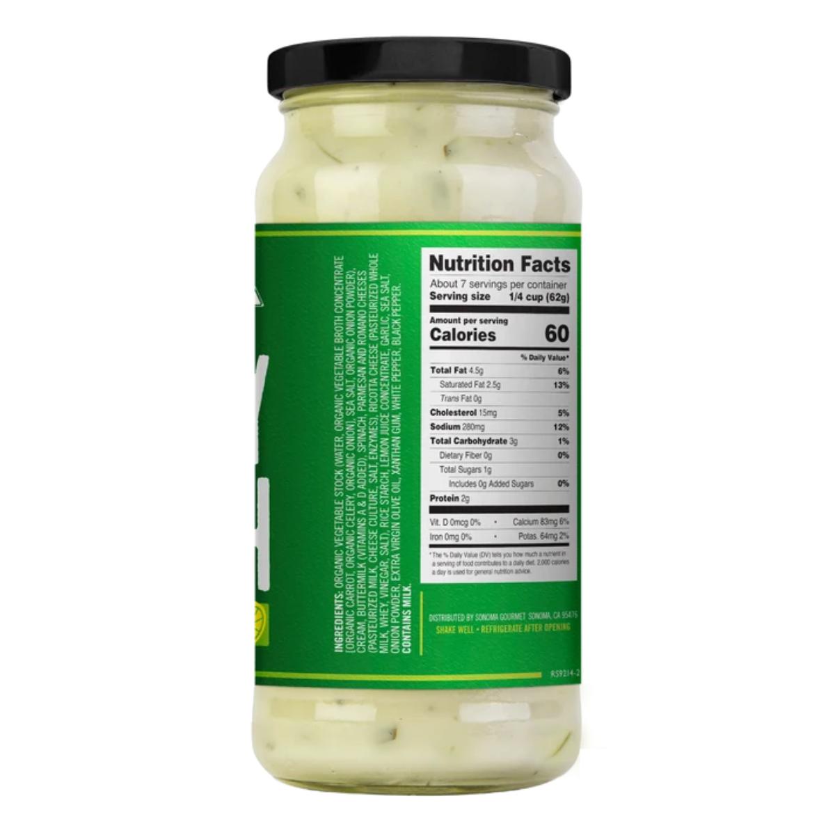 Creamy Spinach Alfredo sauce in a glass jar with a green label showing nutrition facts and ingredients.
