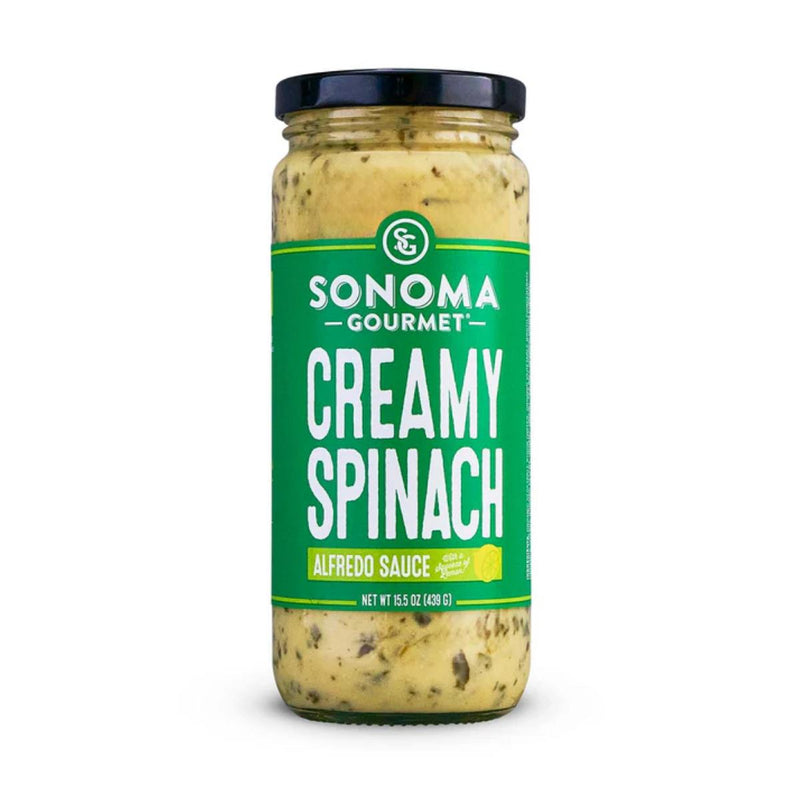 439g glass jar of Sonoma Gourmet Creamy Spinach Alfredo sauce with a green label and black lid.