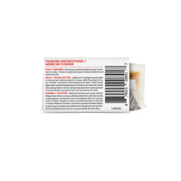 White product packaging for Jamaican Jerk Chicken Stir Fry Kit with red cooking instructions and barcode.