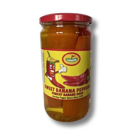 Glass jar of Lakeside Sweet Banana Peppers with a red lid and yellow label featuring a cartoon pepper.