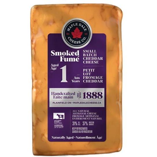 Maple Dale 1 Year Smoked Cheddar, a rectangular block of orange cheese in clear packaging with a purple label.