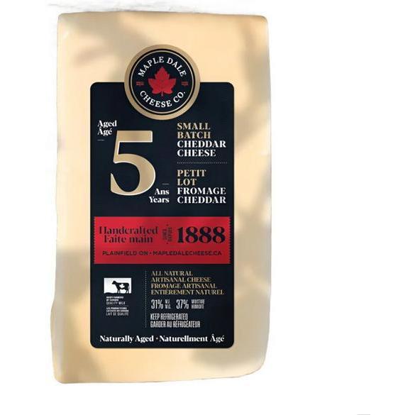 Maple Dale 5 Year Old Cheddar, a rectangular block of yellow cheese in black and red packaging.