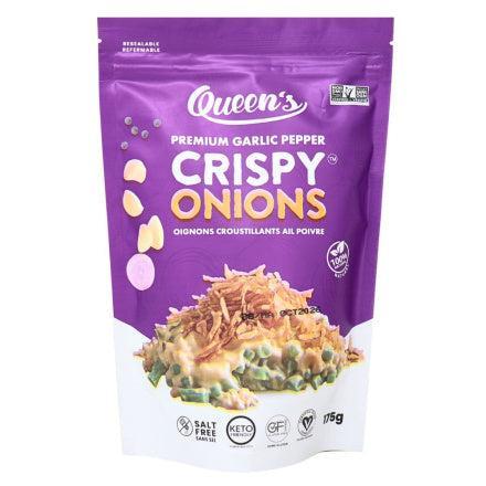 Purple pouch of Queen's Premium Garlic Pepper Crispy Onions, shown sprinkled on a green bean casserole.