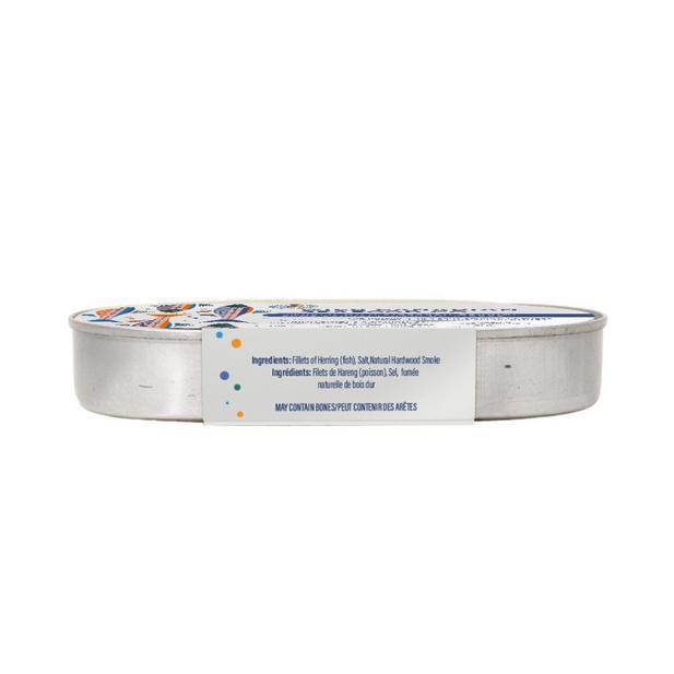 Silver oval tin of Smoked Wild Kippered Herring with a white label showing ingredients and colorful fish illustrations.