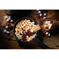 S'mores Dip Skillet with toasted marshmallows, melted chocolate, graham crackers, and waffle cone.