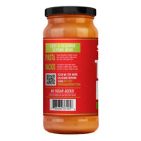 Jar of Sonoma Gourmet Tomato Basil Alfredo sauce featuring a red label with serving ideas, a QR code, and barcode.