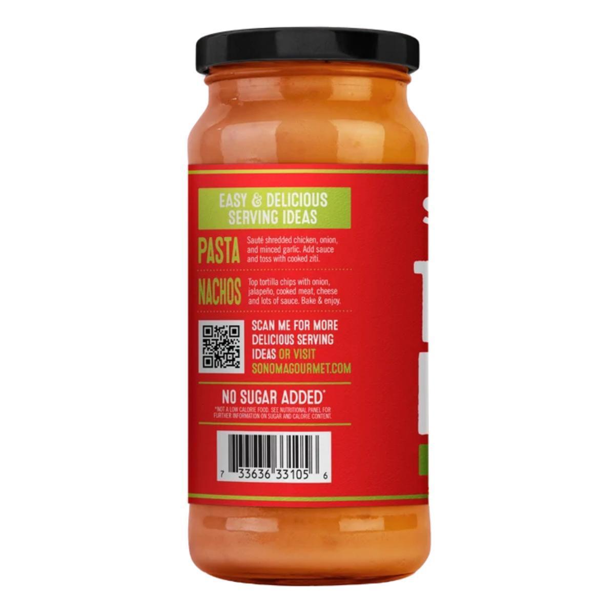 Jar of Sonoma Gourmet Tomato Basil Alfredo sauce featuring a red label with serving ideas, a QR code, and barcode.
