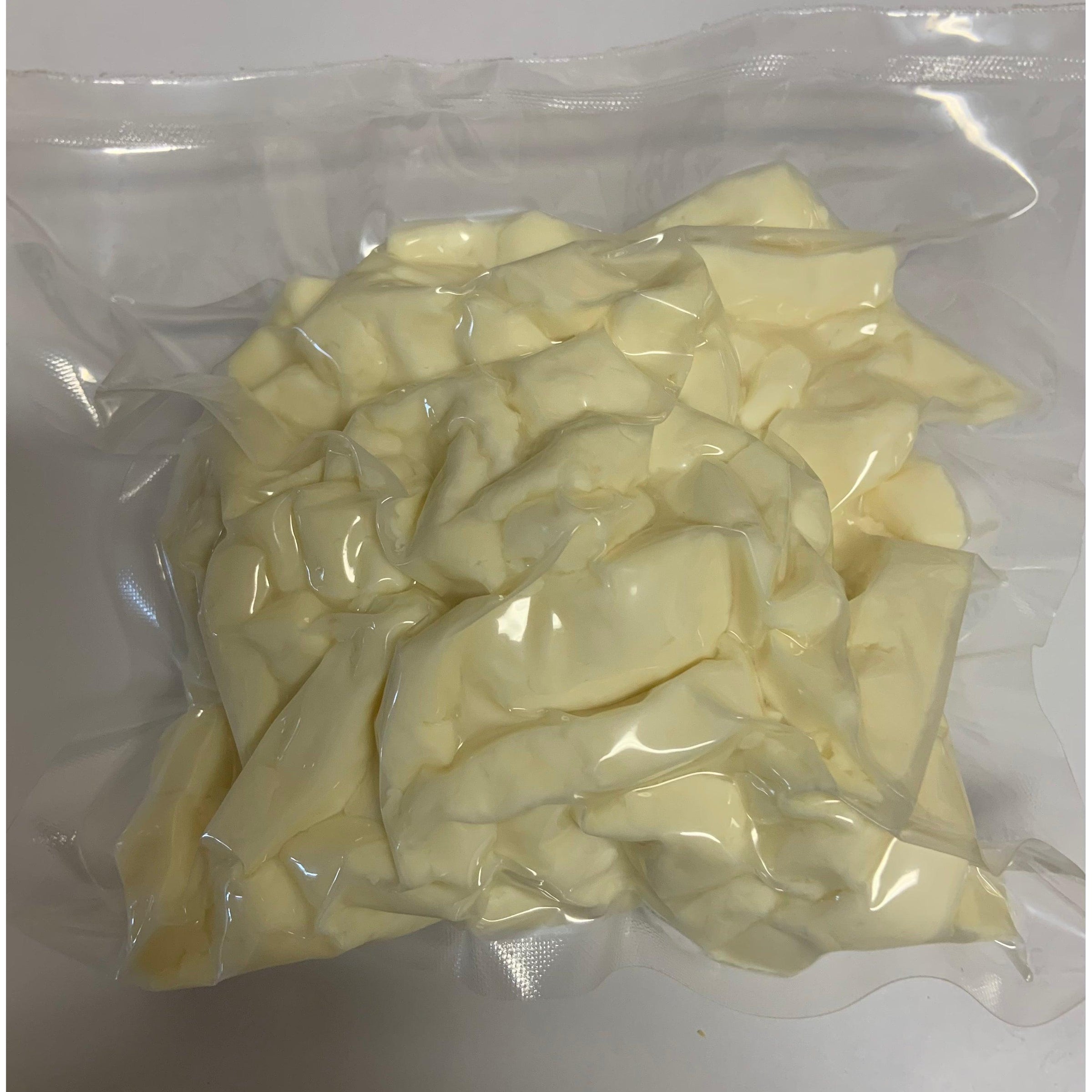300g bag of white cheese curds, vacuum-sealed in clear plastic packaging.