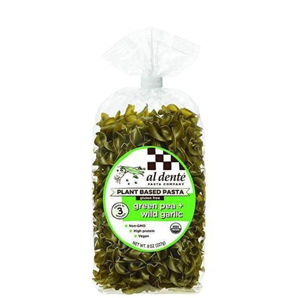 Al Dente green pea + wild garlic plant-based pasta spirals in a clear 227g bag.