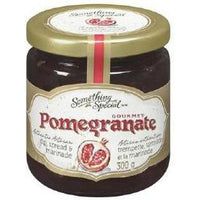 Gourmet Pomegranate Spread in a clear glass jar with a gold lid and elegant label.