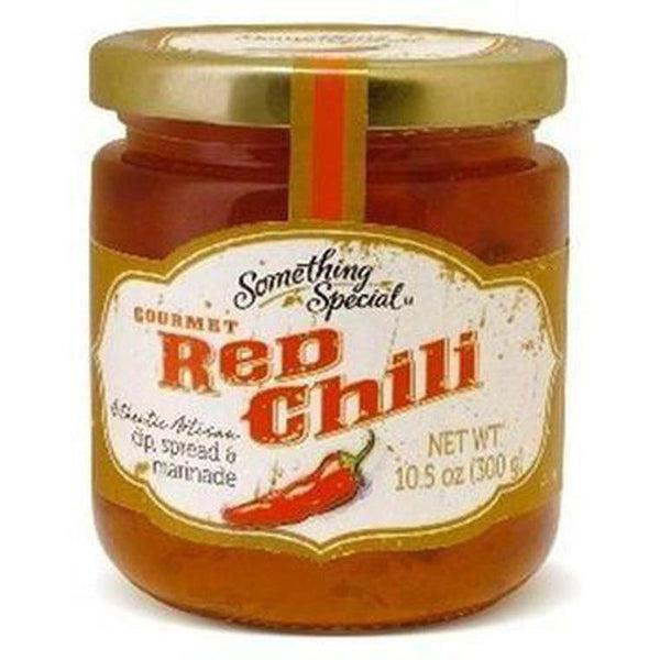 Gourmet Red Chili Spread in a clear glass jar with a gold lid and cream label featuring a red chili pepper.