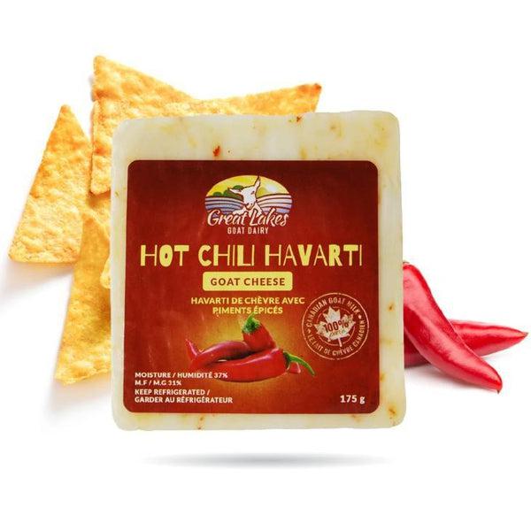 Block of Hot Chili Havarti Goat Cheese with red label, chili peppers, and tortilla chips.