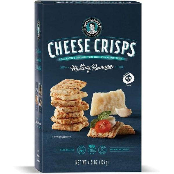 Macy's Melting Romano Cheese Crisps box, dark blue with product image: stacked crisps, cheese wedge, garlic, and a crisp with tomato and basil.